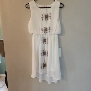 Woman's sleeveless  mid length  dress size small high low Style